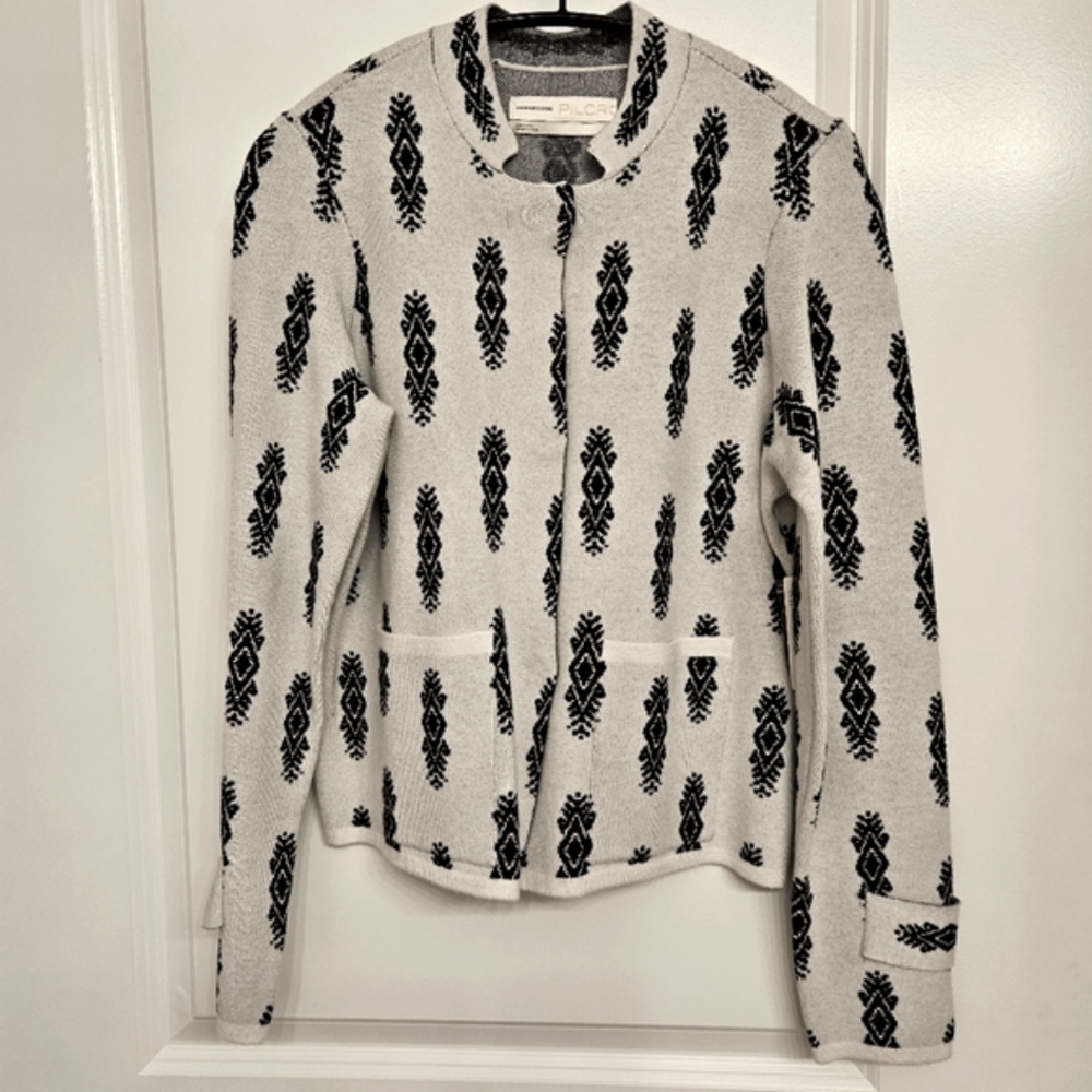 Anthropologie Cardigan with 3 front snap closures & 2 front pockets.